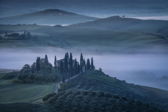 foggy-natural-landscape-with-rustic-villa